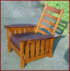 View without the back cushion, showing the quarter-sawn oak grain of the steam bent back.